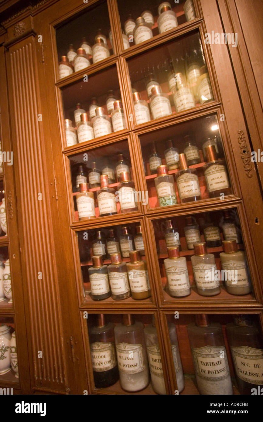 Cabinet containing medicine jars in The pharmacy in the Hotel Dieu Hospice de Beaune Cote d’Or Burgundy France Stock Photo