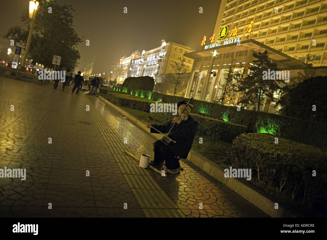 CHINA BEIJING Street performer playing the Erhu two stringed Chinese instrument Stock Photo