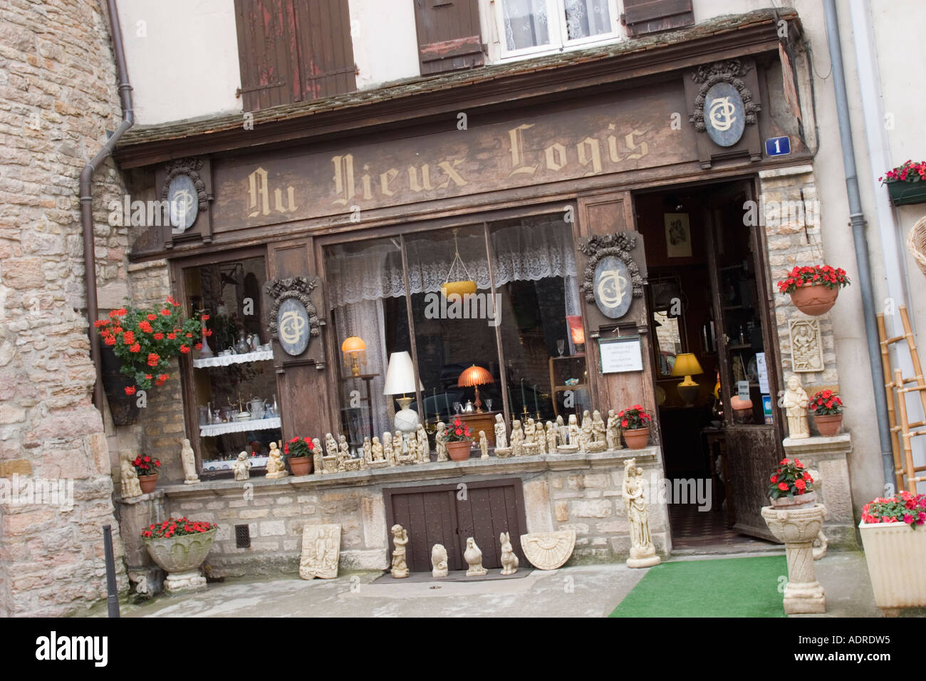Antique shop in medieval town wall of Tournus France Stock Photo