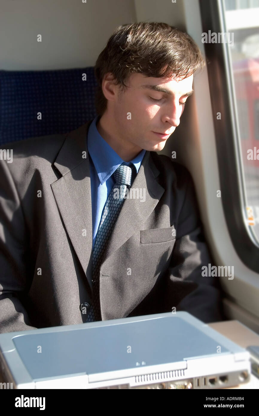 People sleeping on train hi-res stock photography and images - Alamy