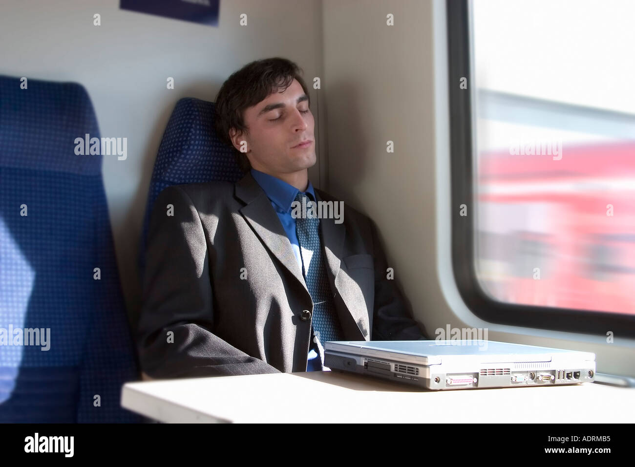 Sleeping on a train hi-res stock photography and images - Alamy