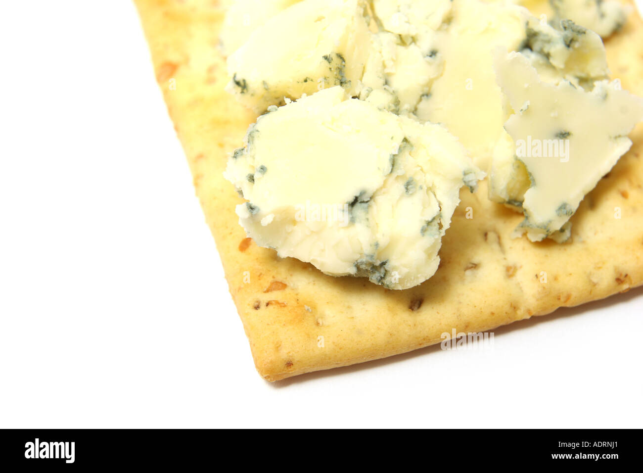 Stilton Shortbread Stilton cheese on a biscuit, Shot on a white studio background Stock ...