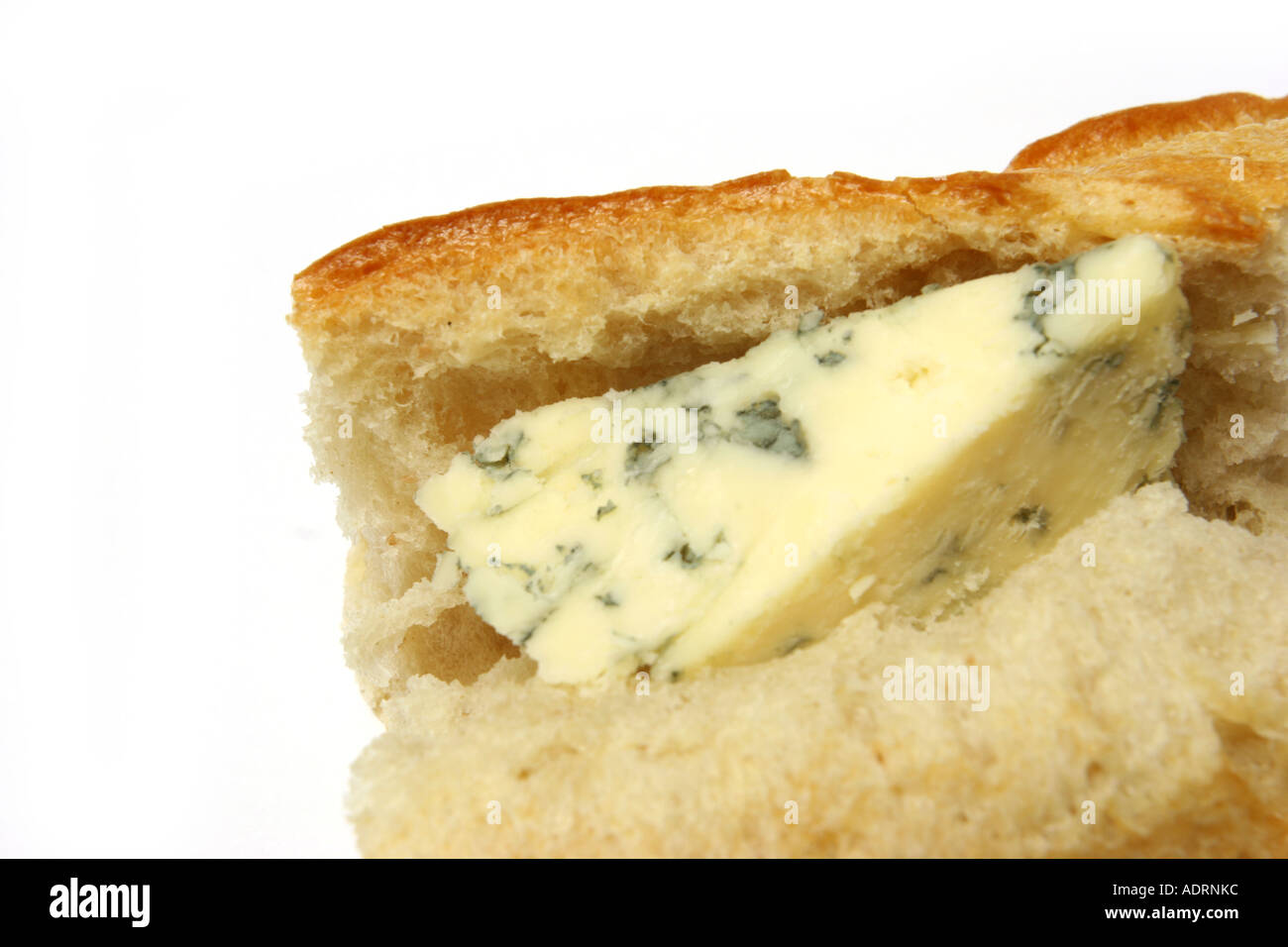Stilton cheese in french stick bread on a white studio background Stock