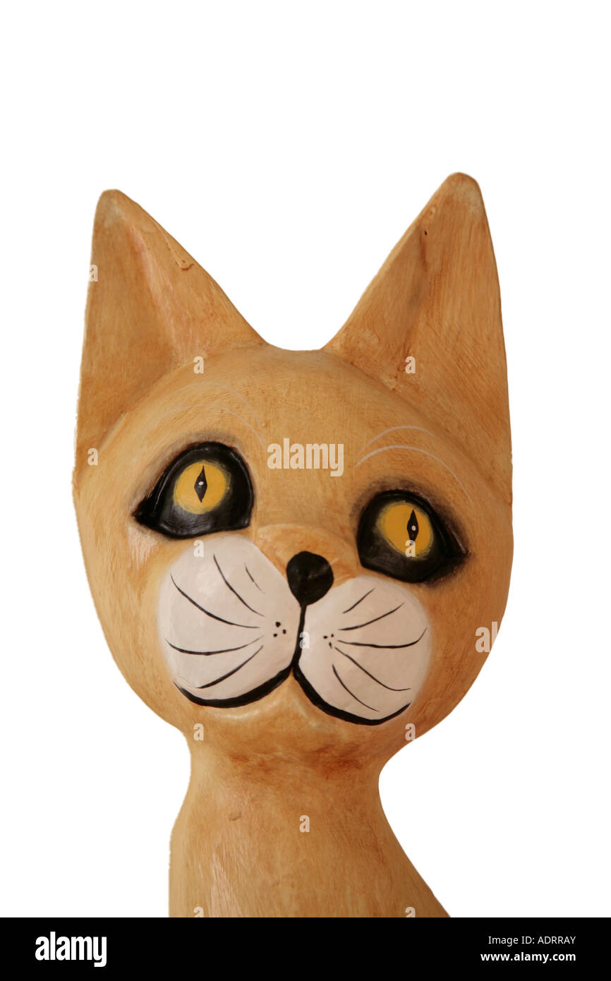 Wooden painted cat on white background Stock Photo - Alamy