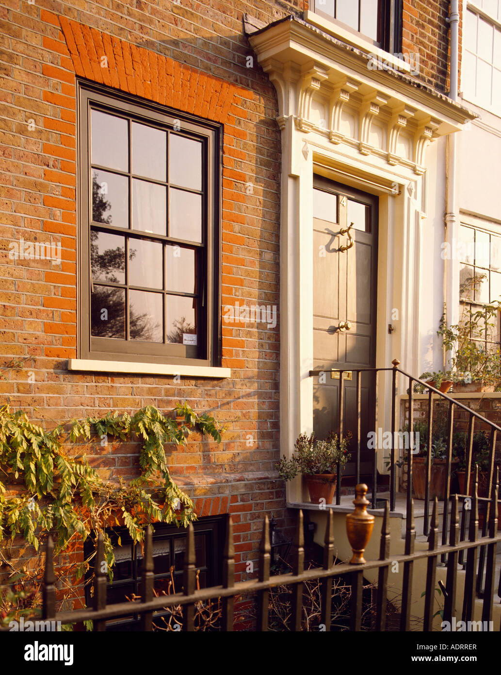 Traditional Georgian House With Pediment Over The Front Door