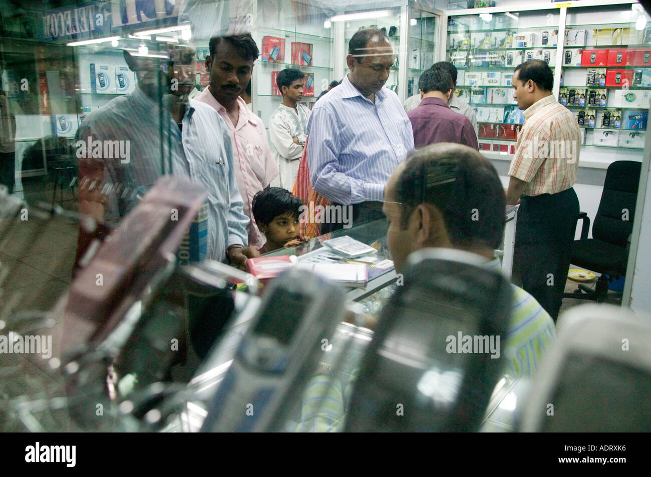 Mobile phone shopping in Dhaka Bangladesh 2006 Stock Photo Alamy