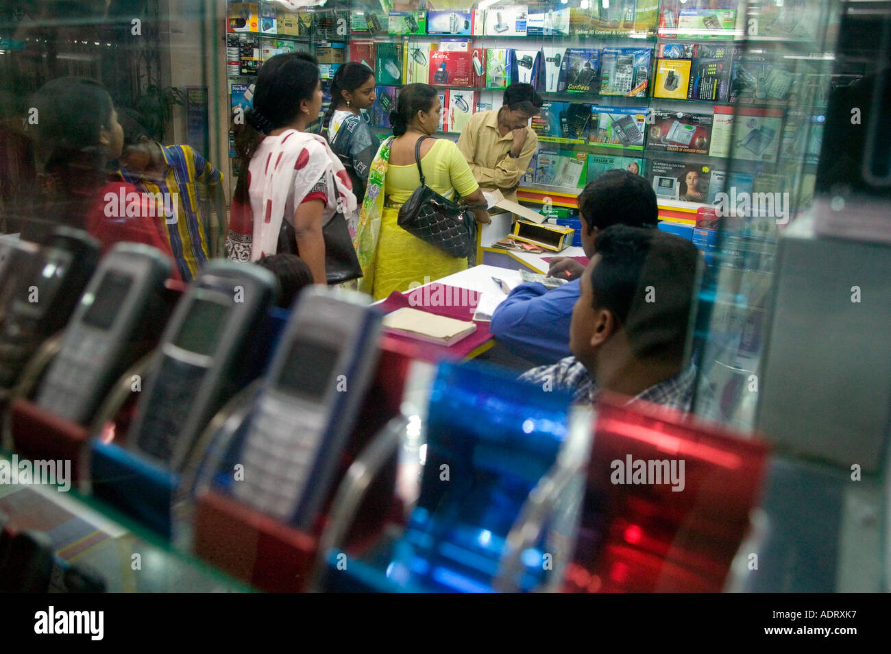 Mobile phone shopping in Dhaka Bangladesh 2006 Stock Photo Alamy