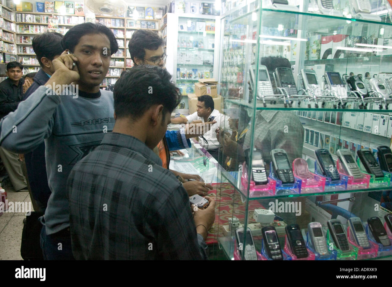 Mobile phone shopping in Dhaka Bangladesh 2006 Stock Photo Alamy