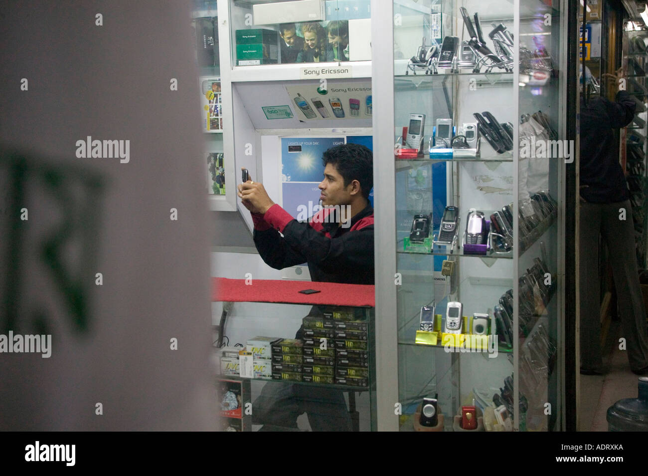 Mobile phone shopping in Dhaka Bangladesh 2006 Stock Photo Alamy