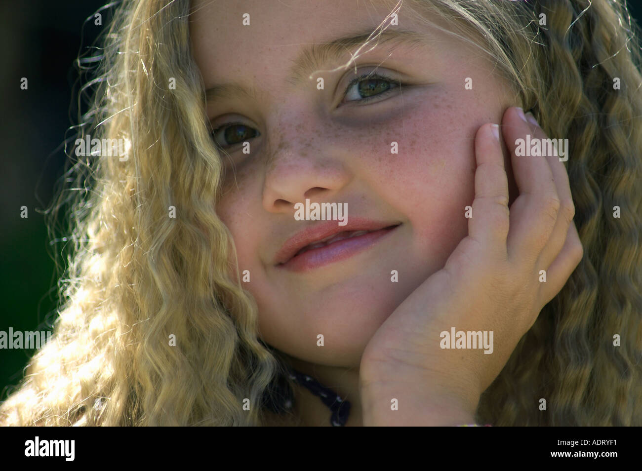 Fair haired girl curly hair hi-res stock photography and images - Alamy