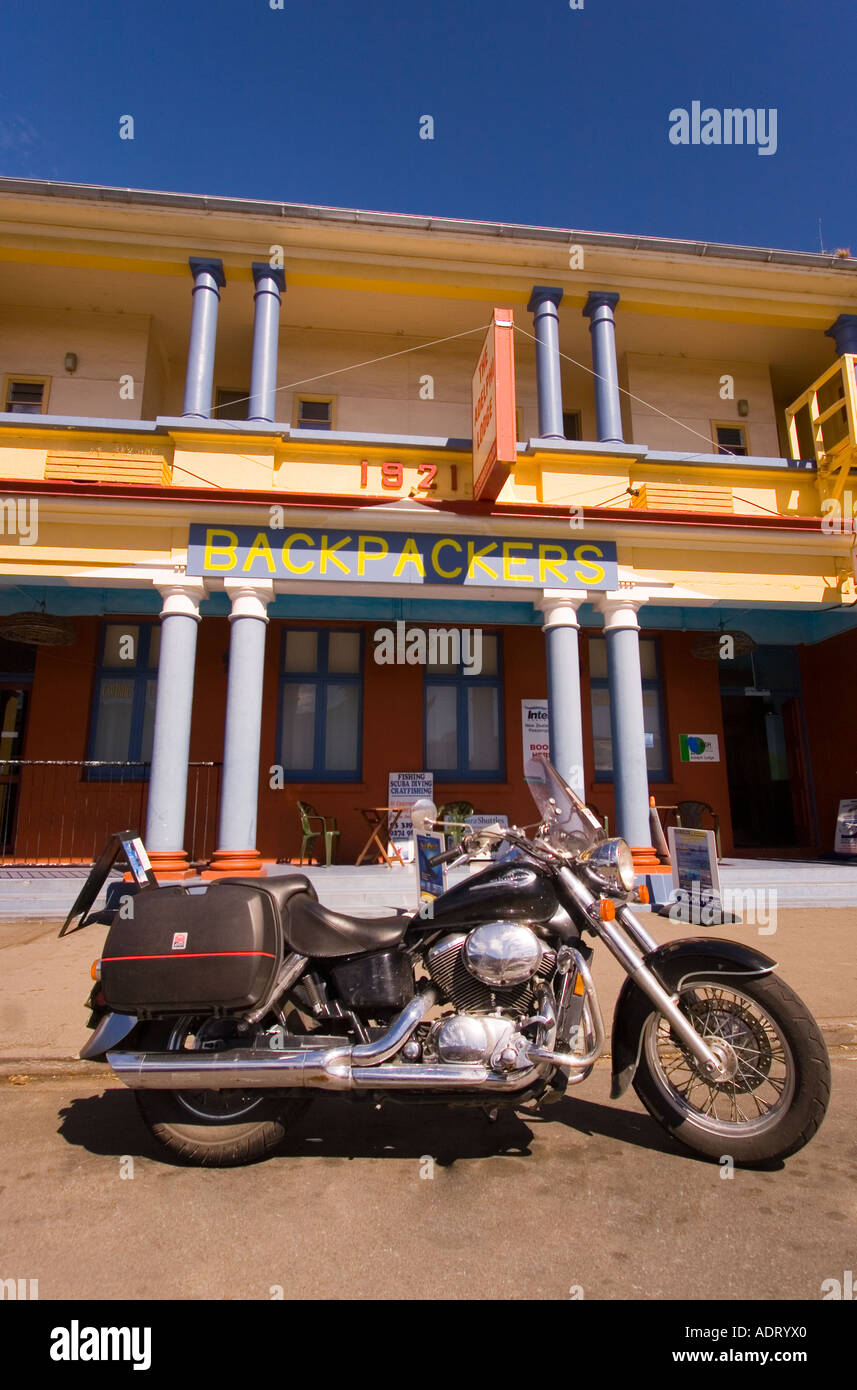 motorcycle parked in front of kaikoura hotel south island new zealand Stock Photo