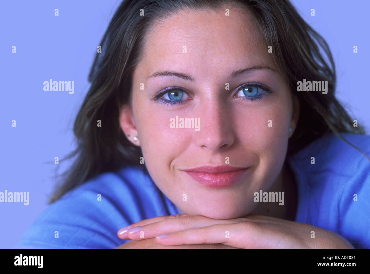 YOUNG WOMAN SMILING Stock Photo