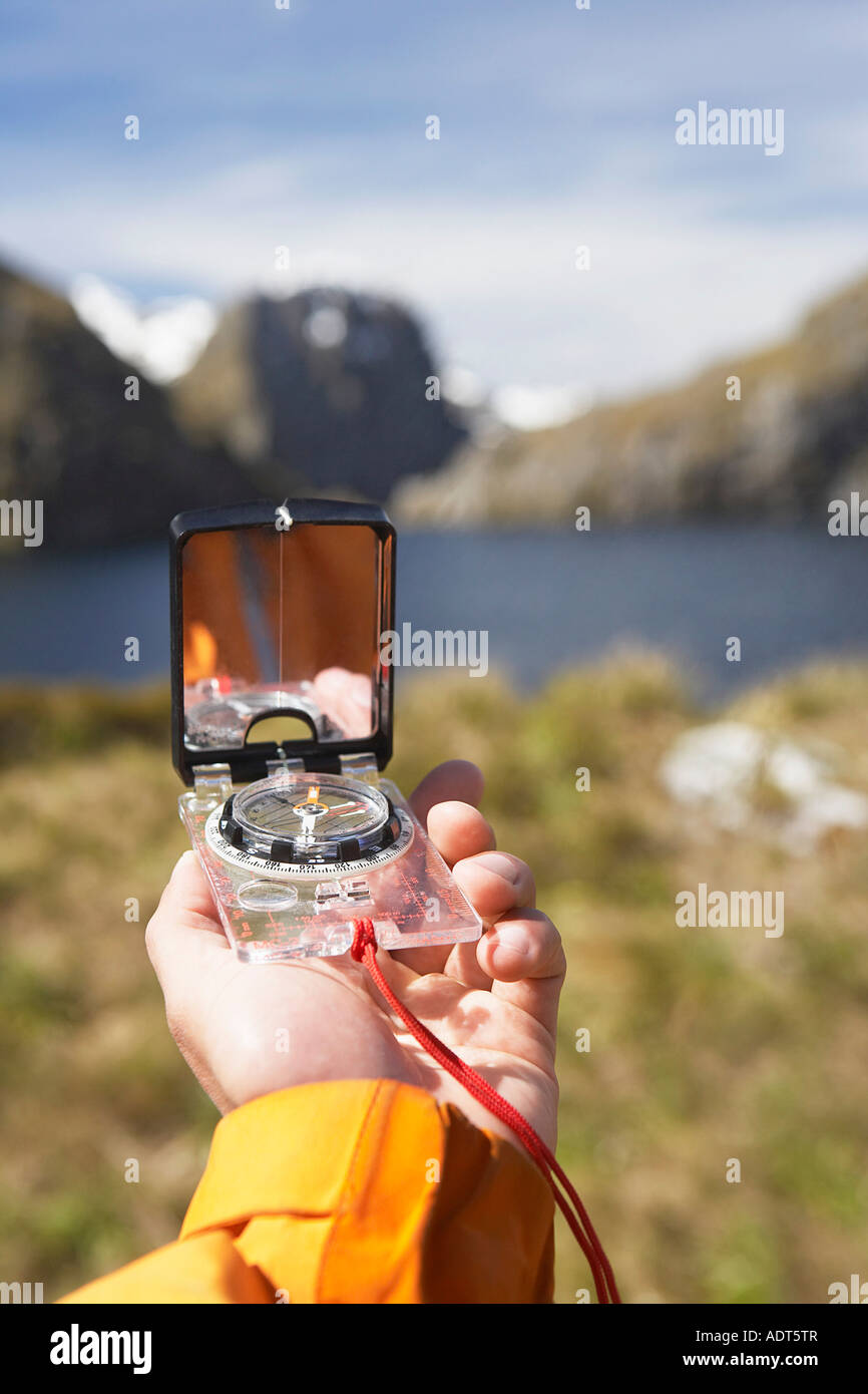 Hand compass mountain lake hi-res stock photography and images - Alamy