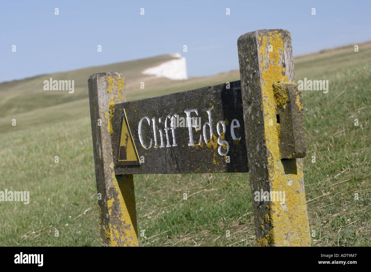 Cliff Edge sign on Beachy head coastline East Sussex England UK Stock Photo