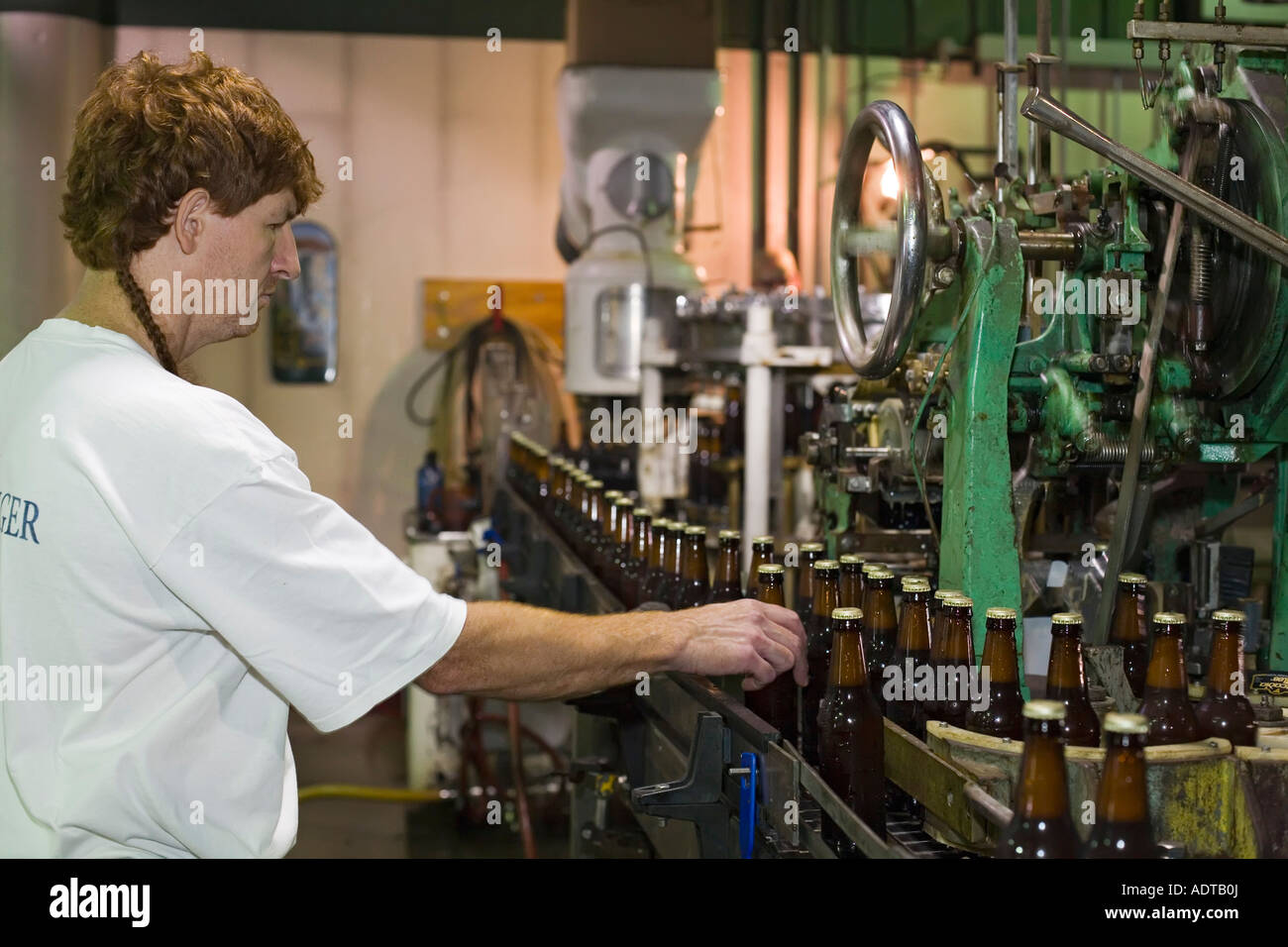 Beer Bottling at Microbrewery Stock Photo