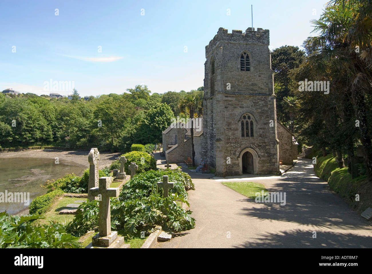 St Just in Roseland parish church beside St Just Pool and Carrick Roads Stock Photo