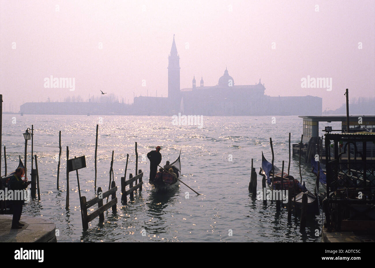 Venice lagoon and gondolas Stock Photo - Alamy