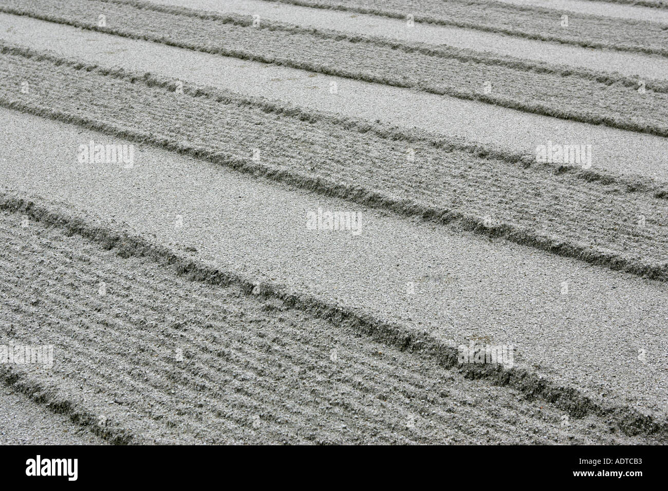Closeup detail of lanscaped silver sand at a zen garden in the grounds of the Silver temple Kyoto Japan Asia Stock Photo