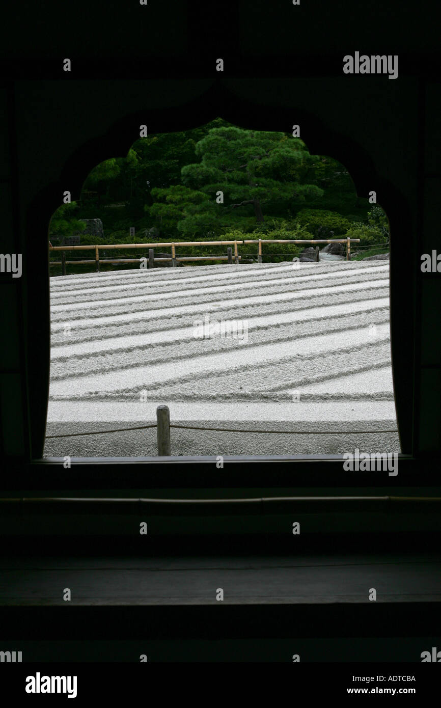 Window view through to the main silver sand zen sculpted garden at the silver temple in ancient Kyoto Japan Asia Stock Photo