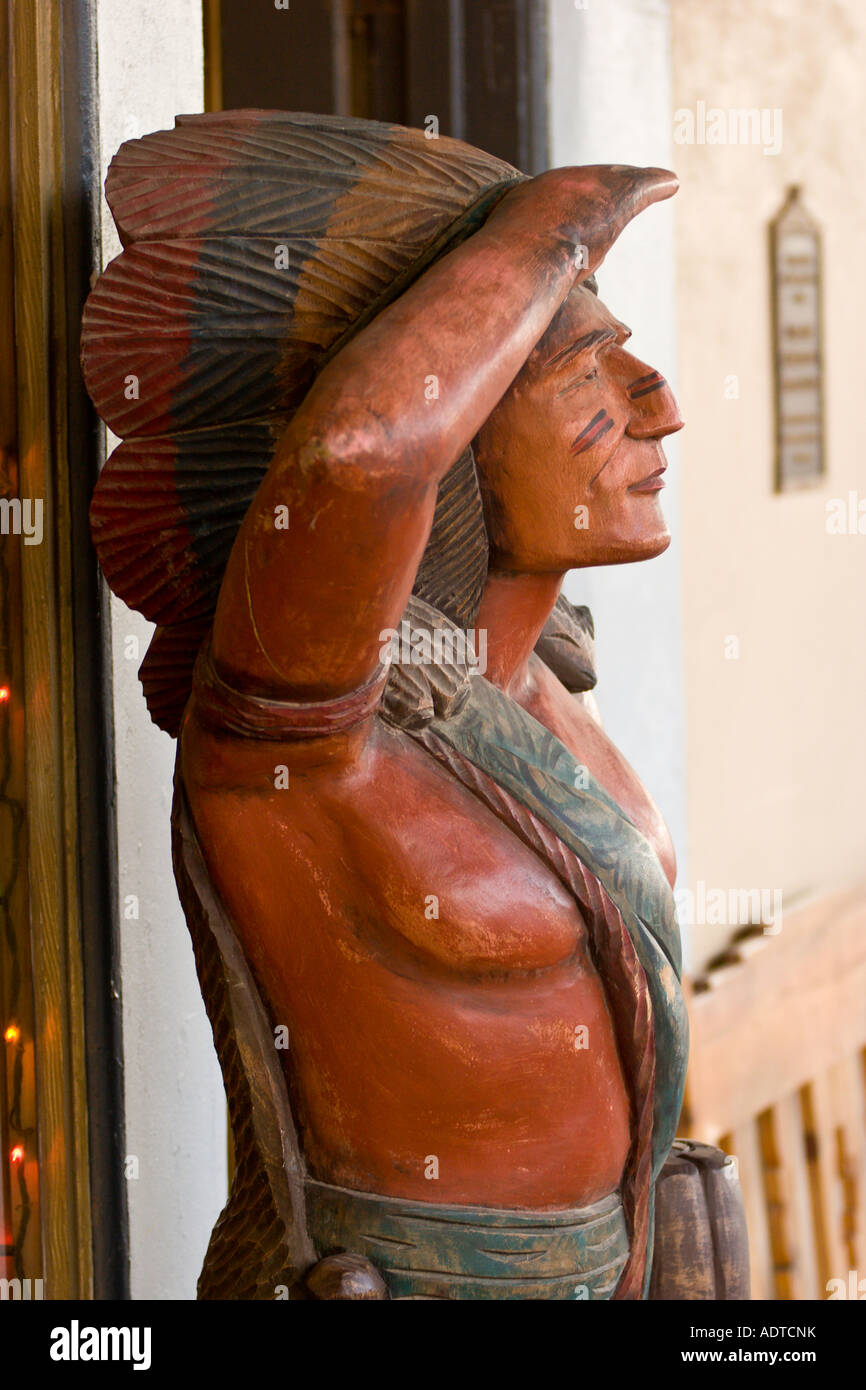 Cigar store wooden Indian sculpture on boardwalk in downtown Tombstone