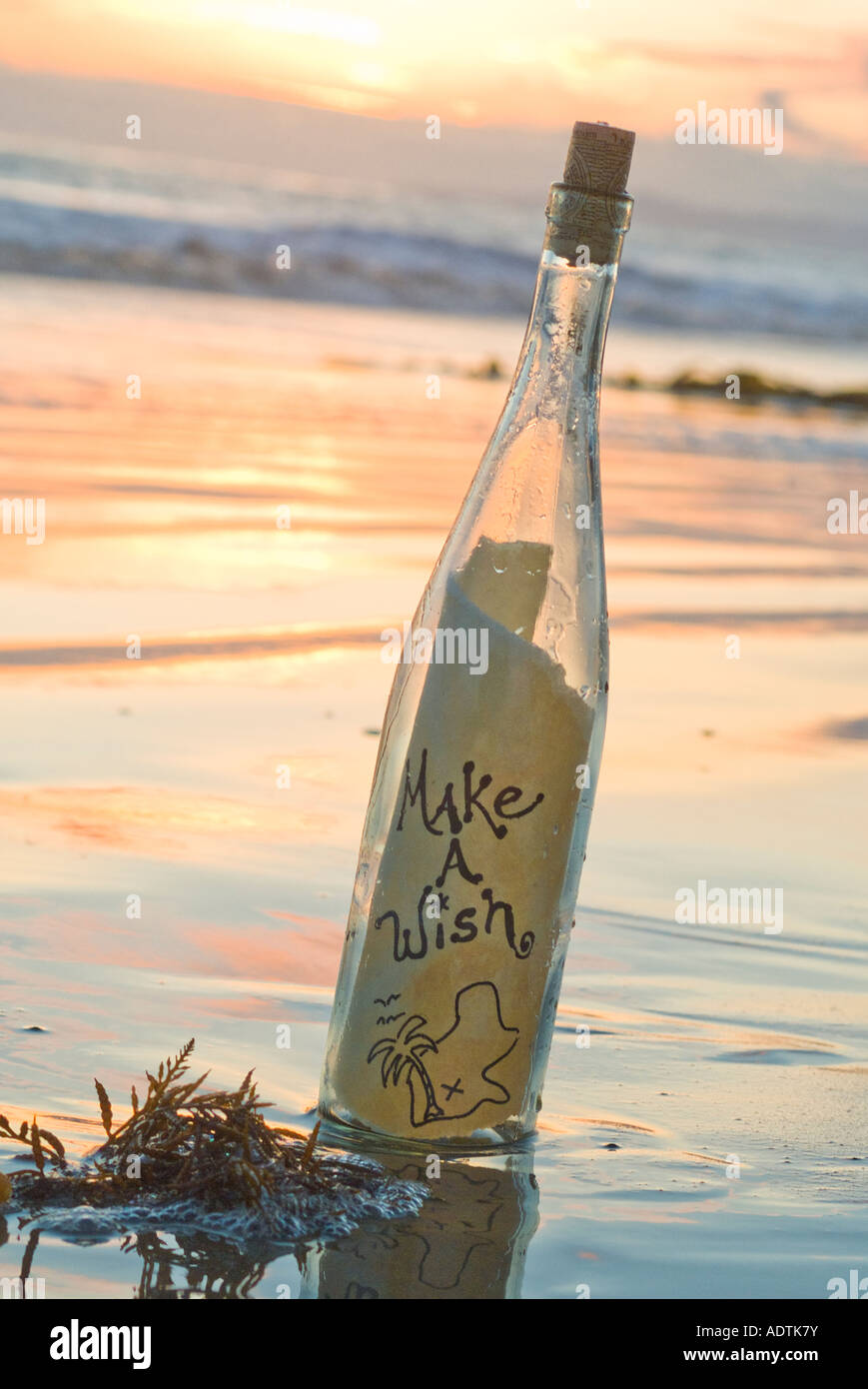 Bottle washed up on the beach with make a wish message and treasure map