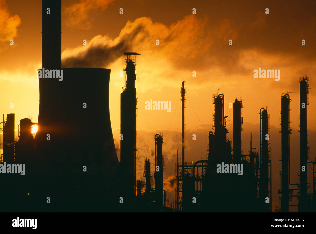 pollution global warming belching chimneys at a chemical plant Port Talbot Wales UK Stock Photo