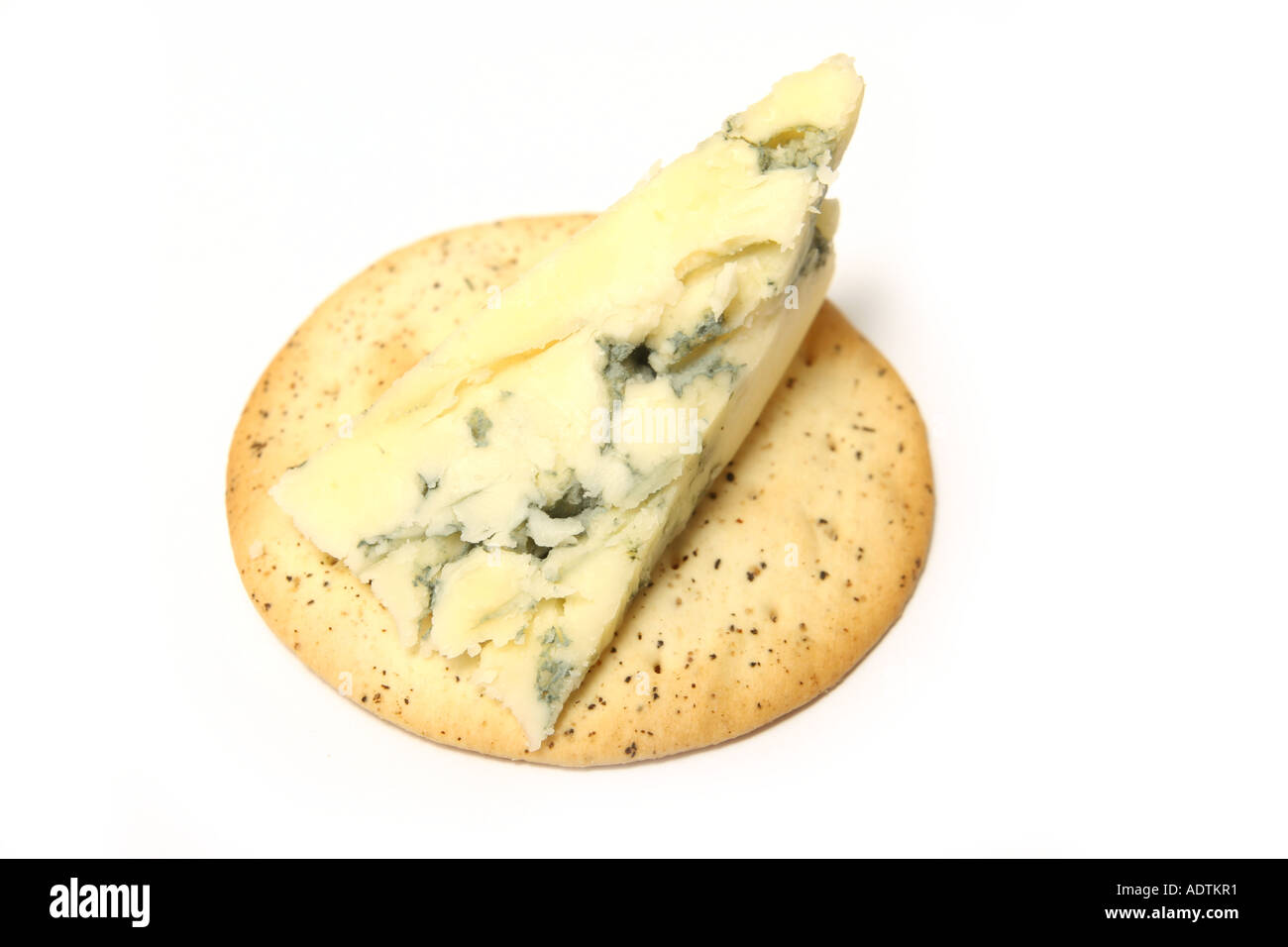 Stilton Shortbread Stilton cheese on a biscuit, Shot on a white studio background Stock ...