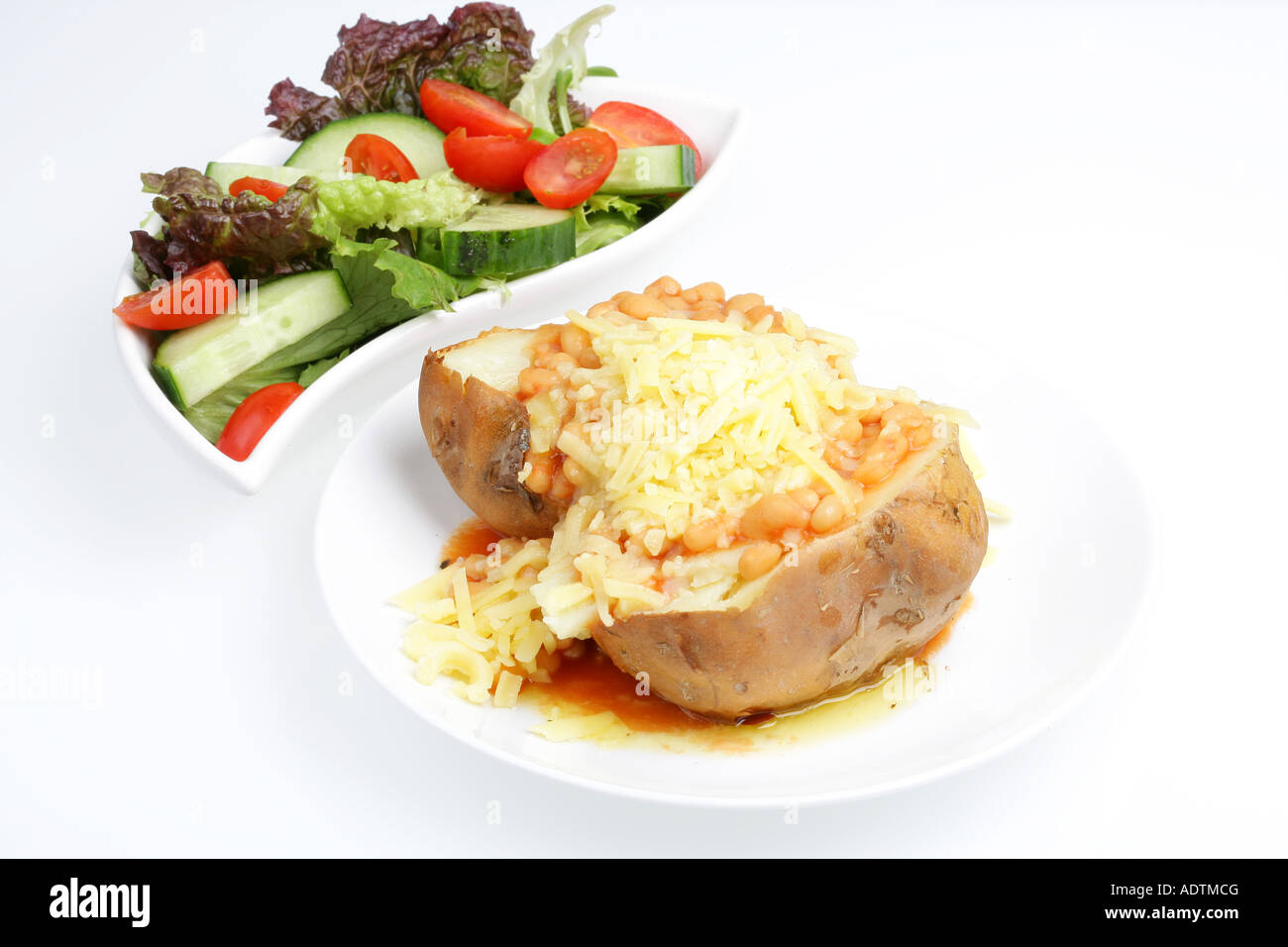 Jacket Potato and Cheese with Side Salad Stock Photo Alamy