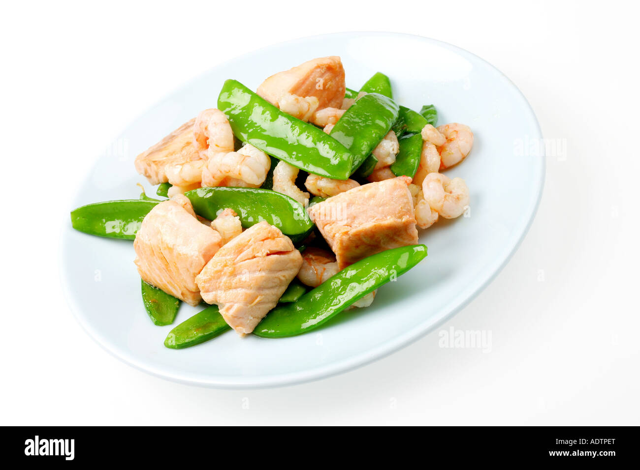 Salmon Prawn and Mange Tout Stir Fry Stock Photo Alamy