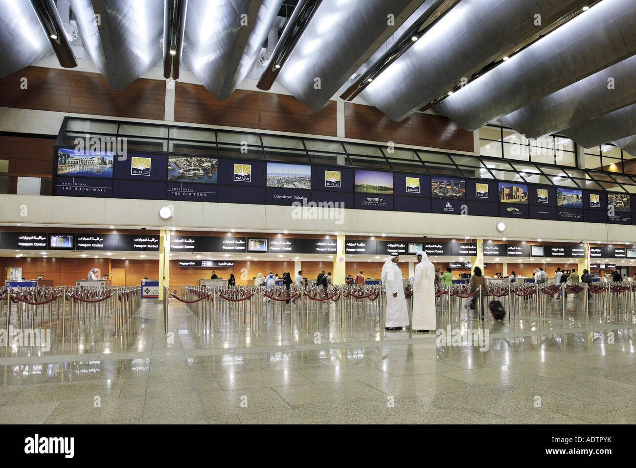 Passport control in Dubai international airport Stock Photo Alamy
