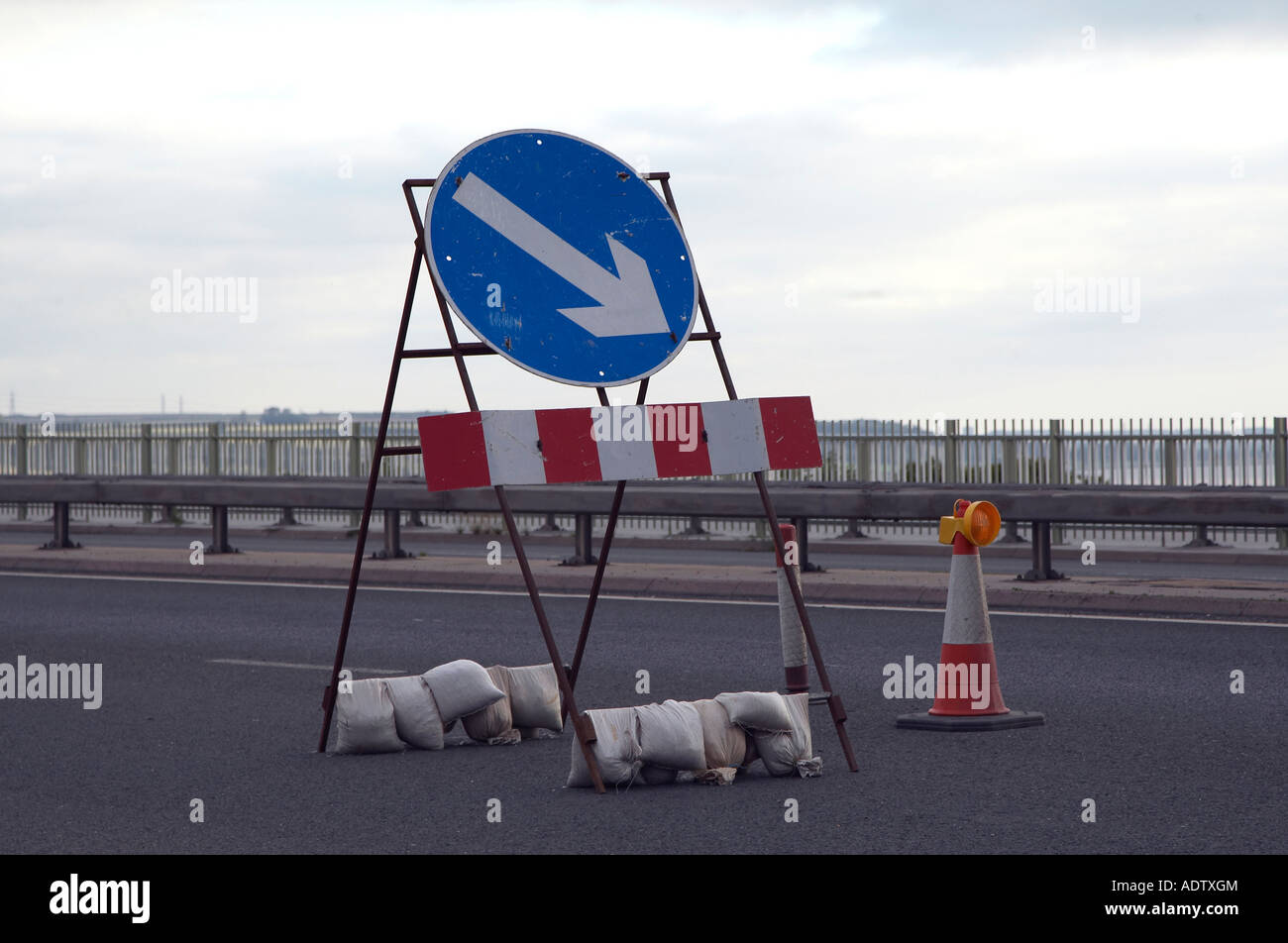Direction indicating road sign white arrow on blue background Stock ...