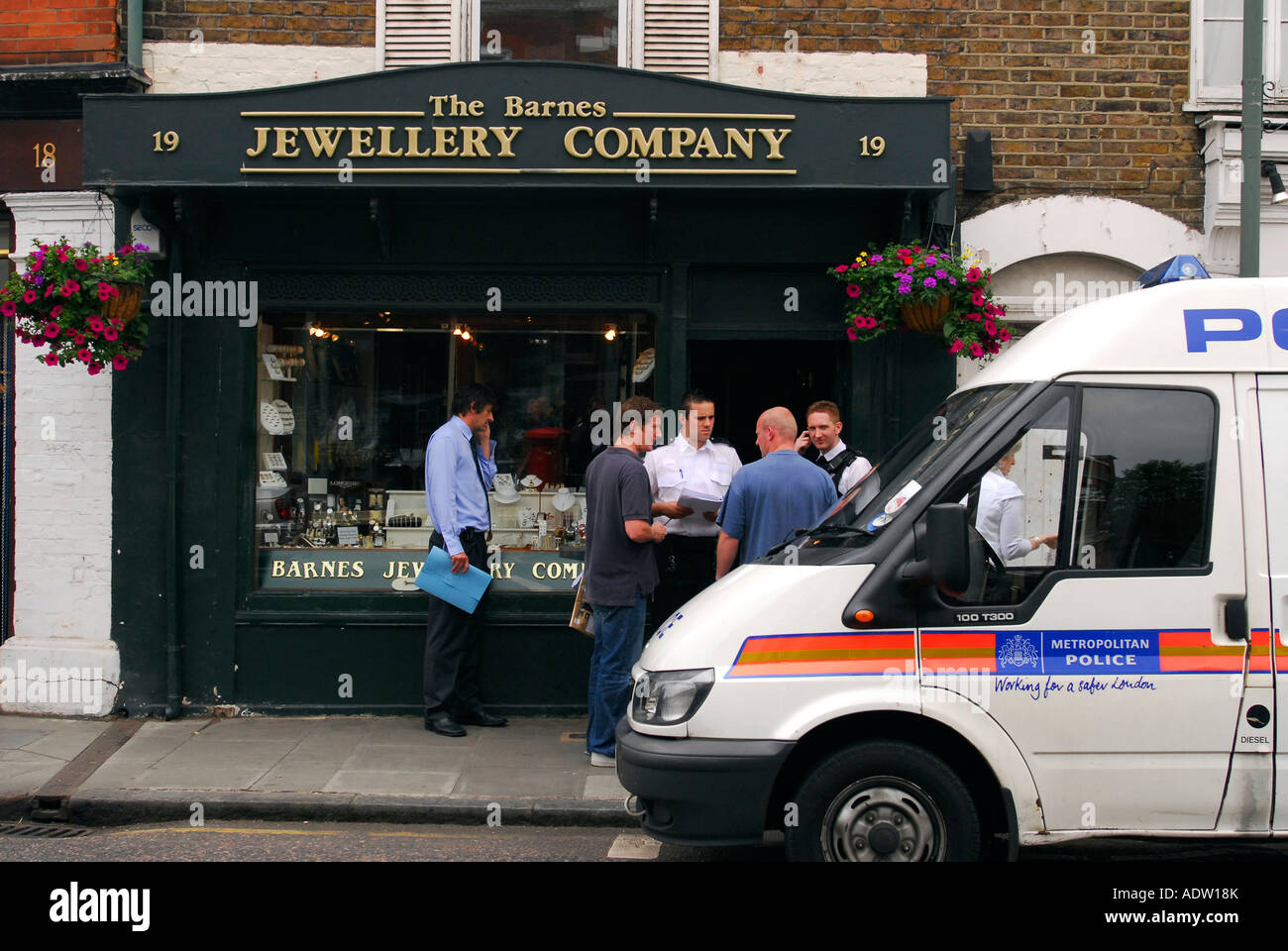 Metropolitan Police Officers attending the aftermath of a jewellery