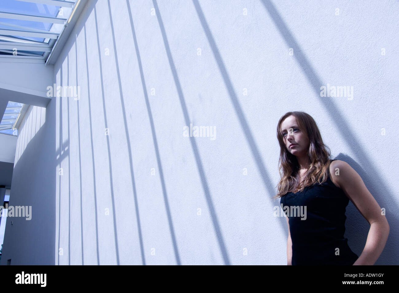 Woman casting shadow hi-res stock photography and images - Alamy