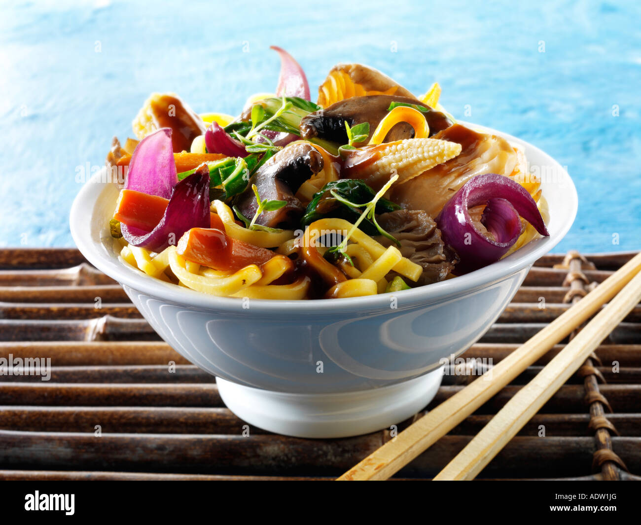 Oriental vegetarian stir fry of vegetables noodle and mushrooms Stock Photo