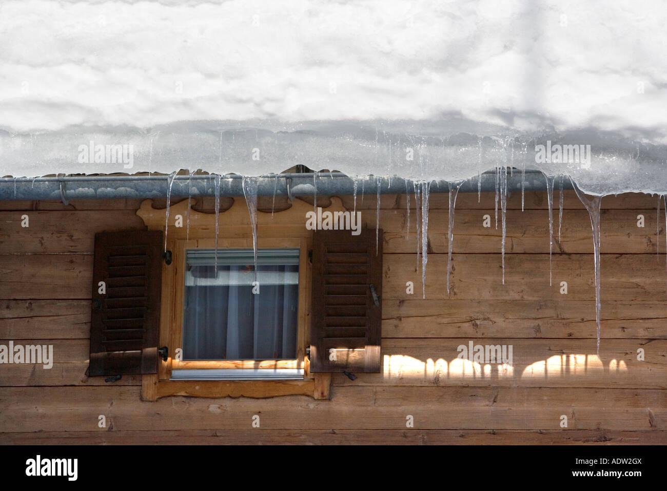 Icicles and building Ellmau Austria Stock Photo