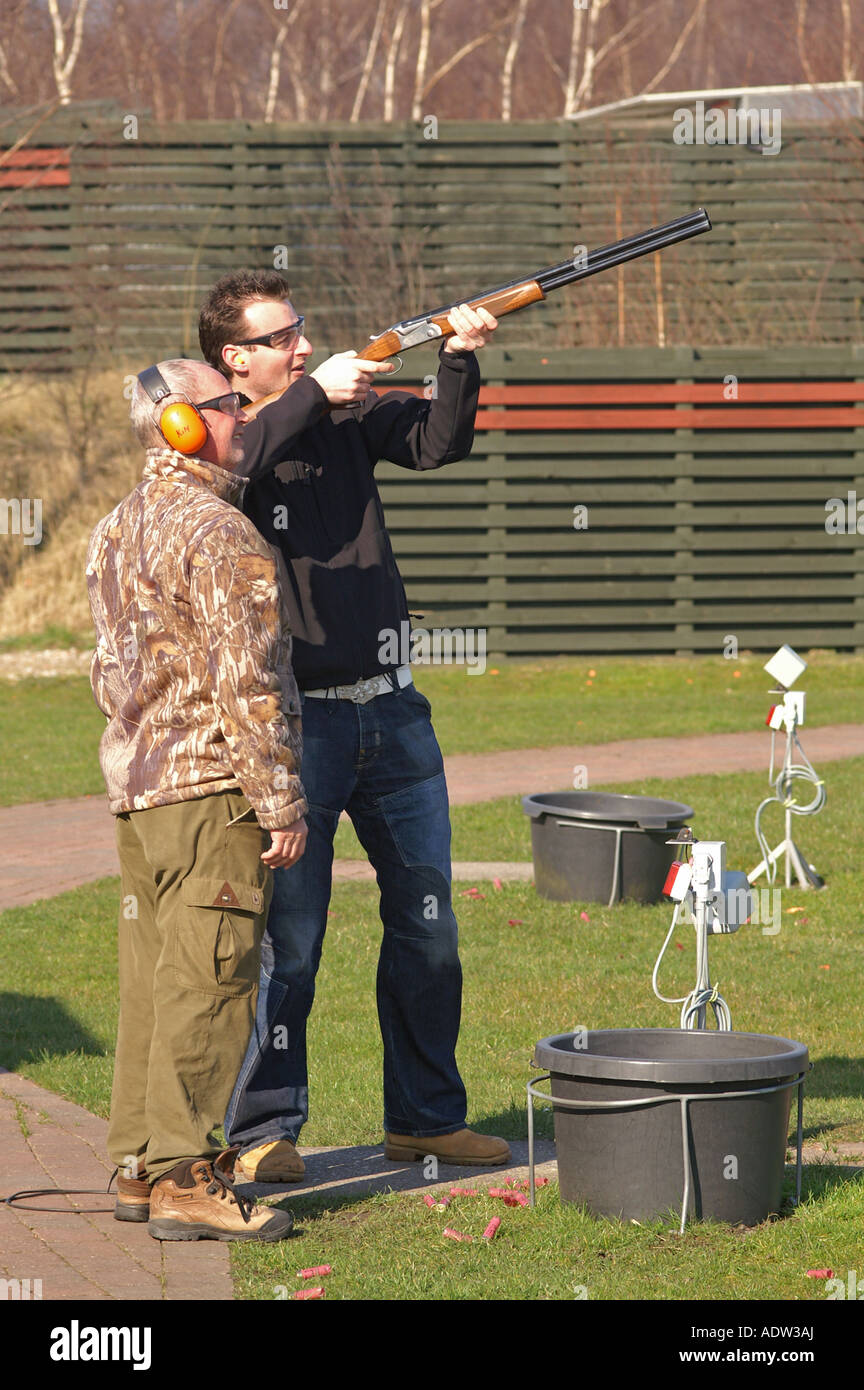 skeet shooting hunting practice with shotgun Stock Photo Alamy