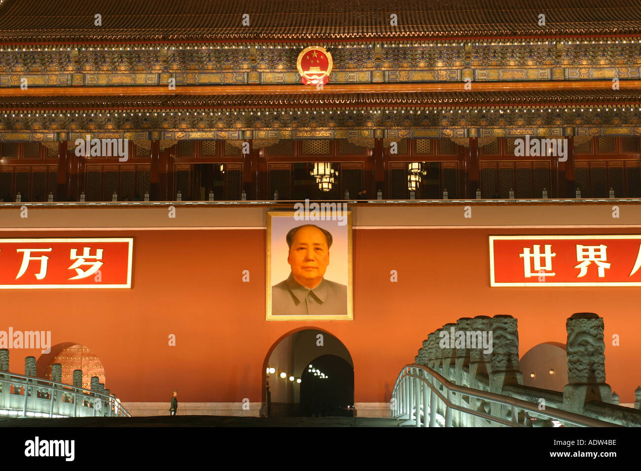 Illuminated night view of the portrait of Mao ZeDong at entrance to Forbidden City Beijing Asia Stock Photo