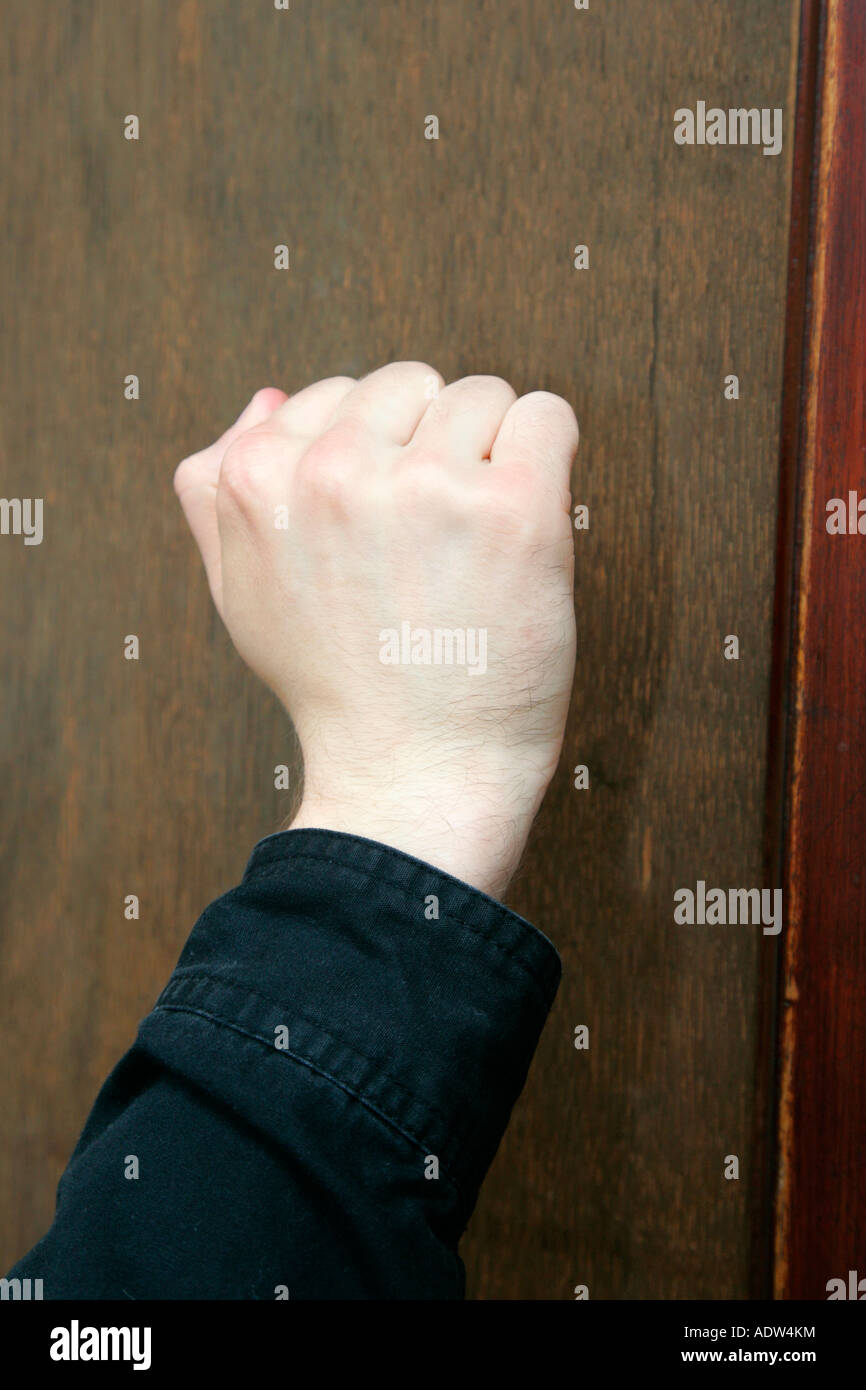 Mans Bare Hand Knocking On Front Door Cold Calling Household Stock Photo Alamy