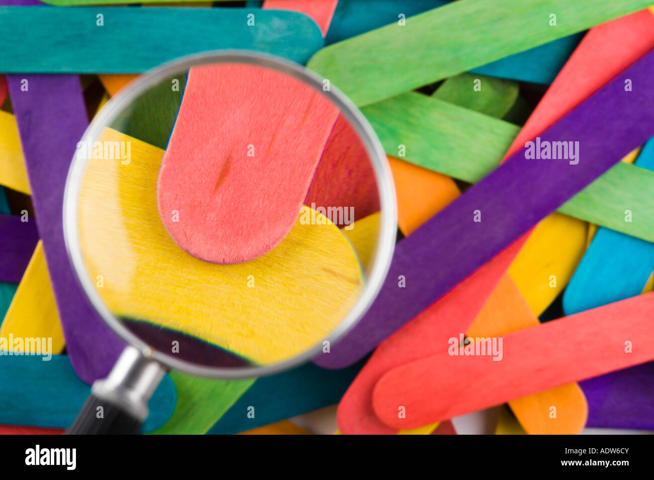 Magnifying Glass On Brightly Colored Craft Sticks Stock Photo Alamy Magnifying glass on brightly colored craft sticks stock photo alamy
