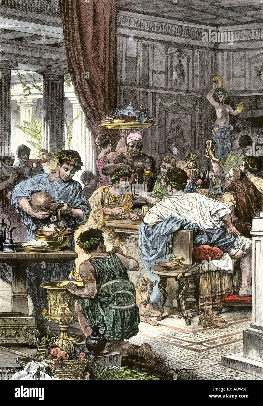 Banquet at a wealthy home in ancient Rome. Hand-colored woodcut Stock Photo