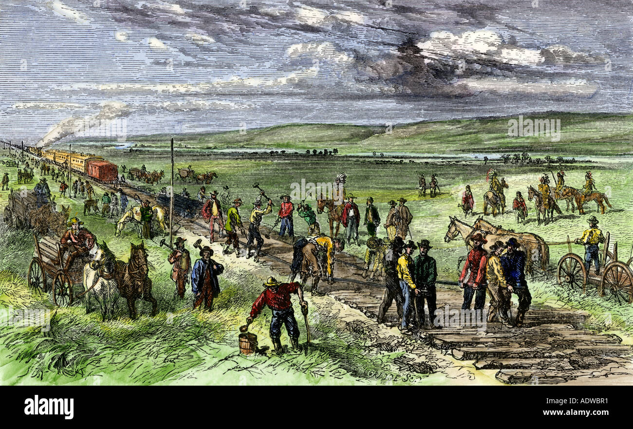 Immigrants and other workers building the transcontinental railroad across Nebraska 1860s. Hand-colored woodcut Stock Photo