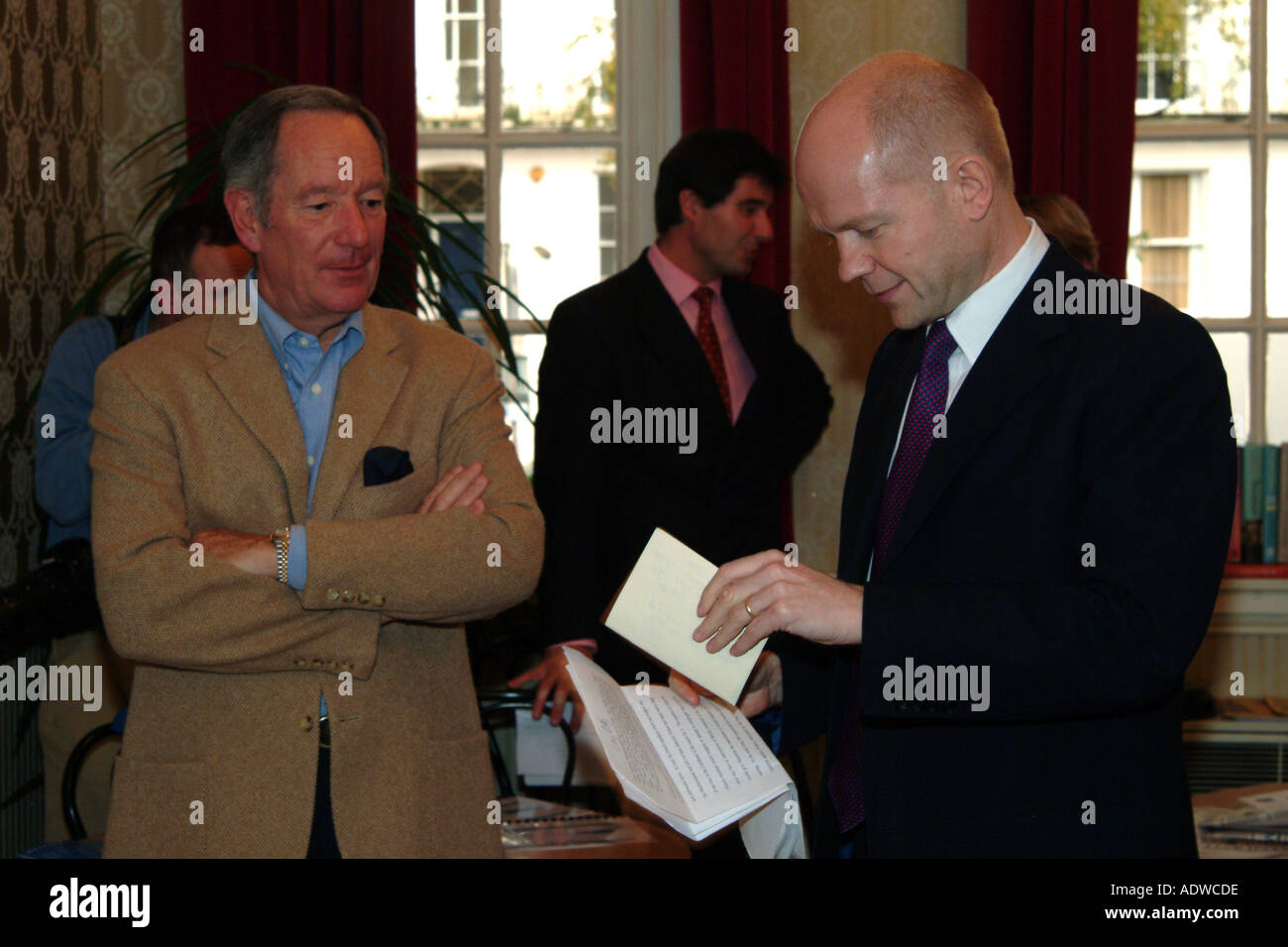 Journalist Newsreader Michael Buerk chats with William Hague former Conservative leader at the Cheltenham Literature Festival Stock Photo