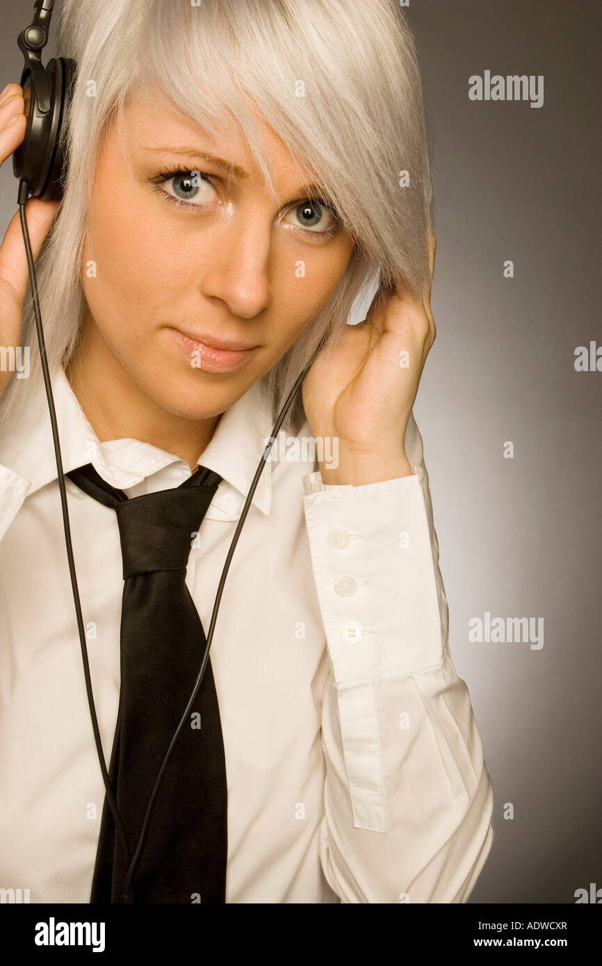 Listening to headphones Stock Photo - Alamy