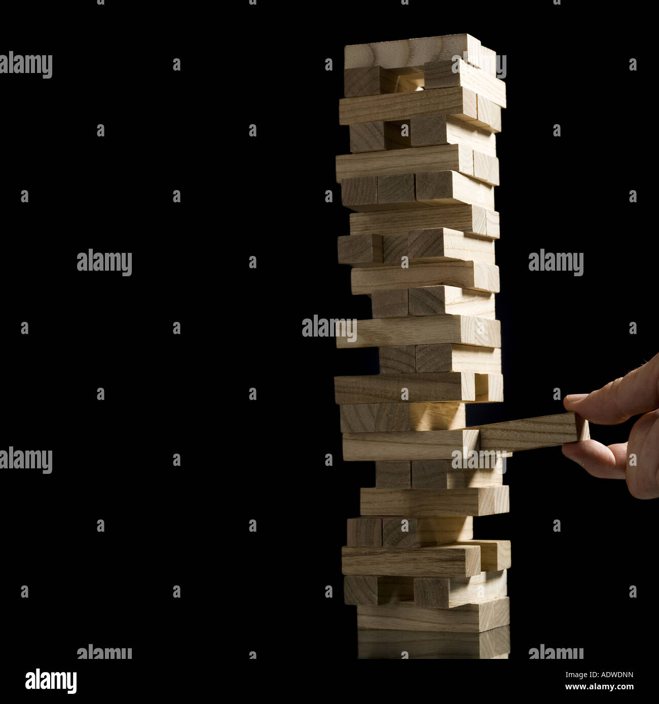 Man removing wooden block hi-res stock photography and images - Alamy