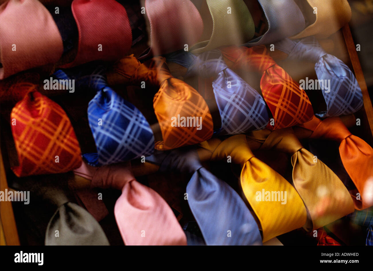 Brightly coloured ties in a shop window in Via Spiga Milan Italy the centre of the fashion district 2001 Stock Photo