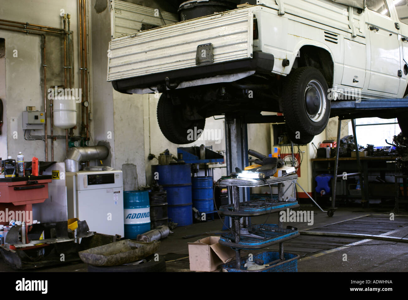 Lifting platform in a garage Stock Photo Alamy