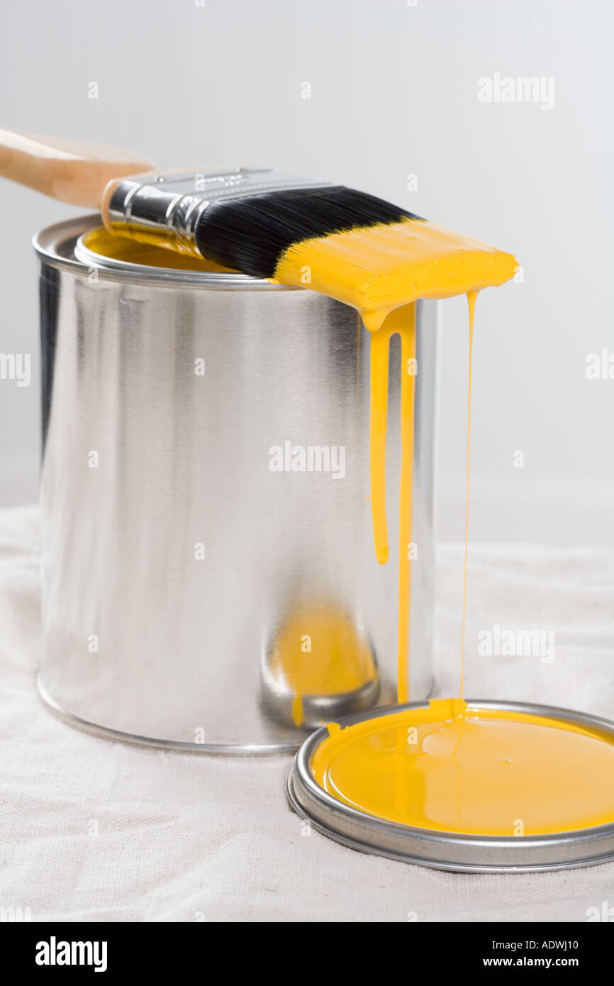 Still life of paint brush with yellow paint Stock Photo Alamy