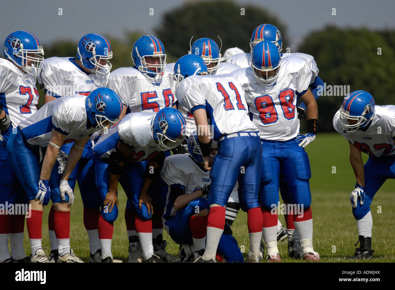 American Football team talking tactics Stock Photo