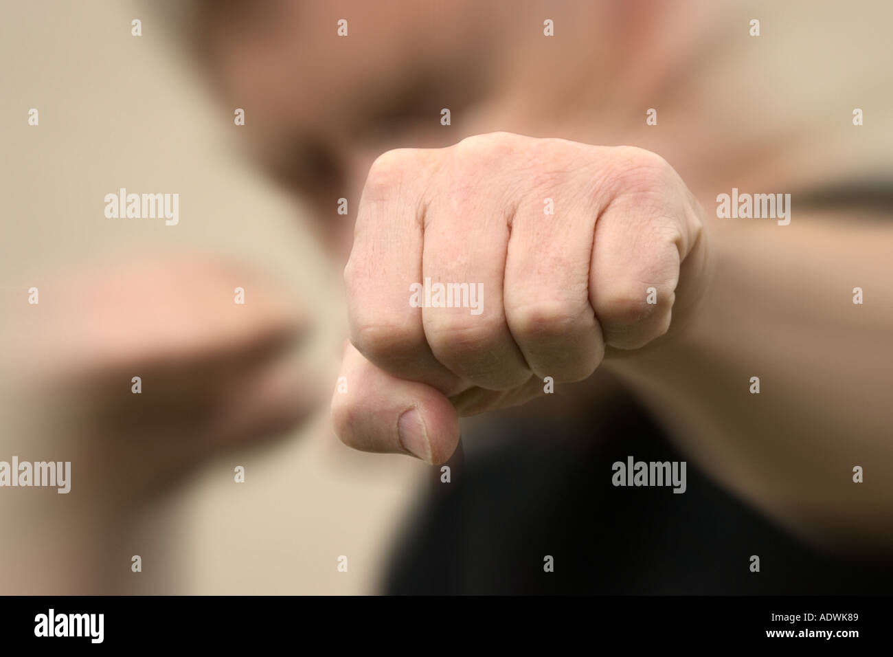 A close up view of a man throwing a punch Stock Photo Alamy