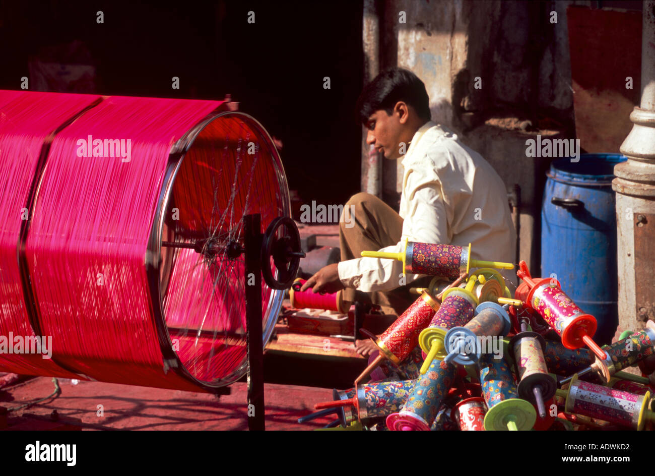 Man winding kite string for kite festival in Ahmedabad Gujarat India Stock  Photo - Alamy